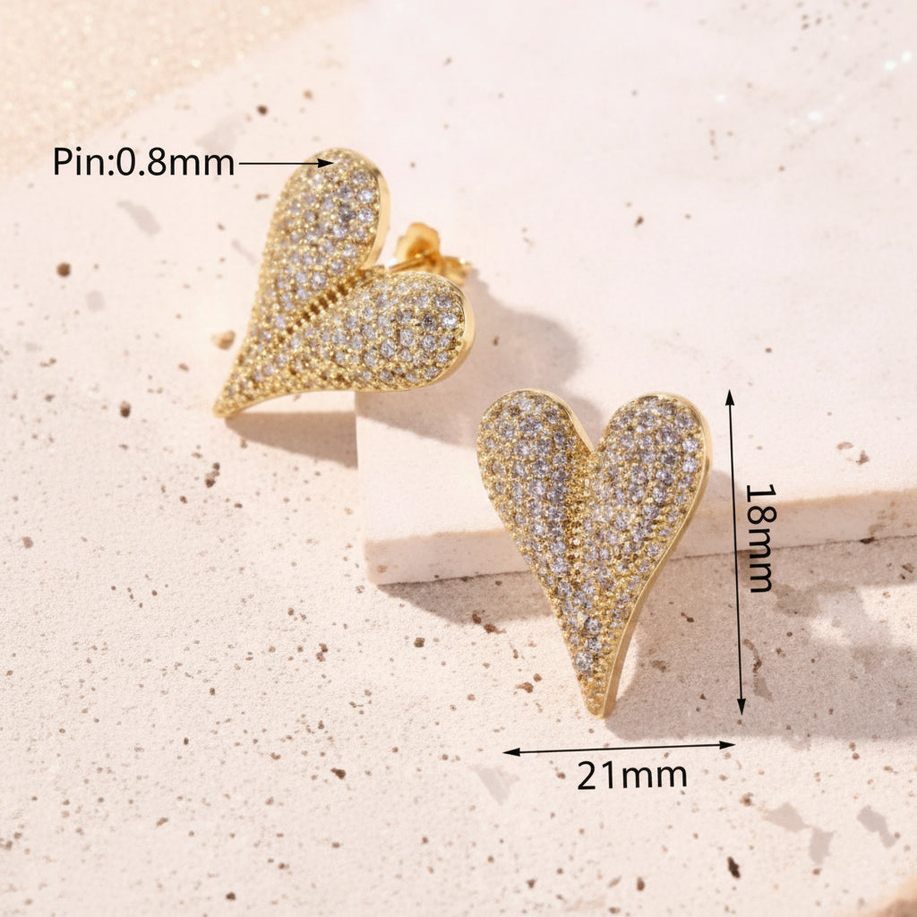 Gold heart-shaped earrings on a white background with measurements.