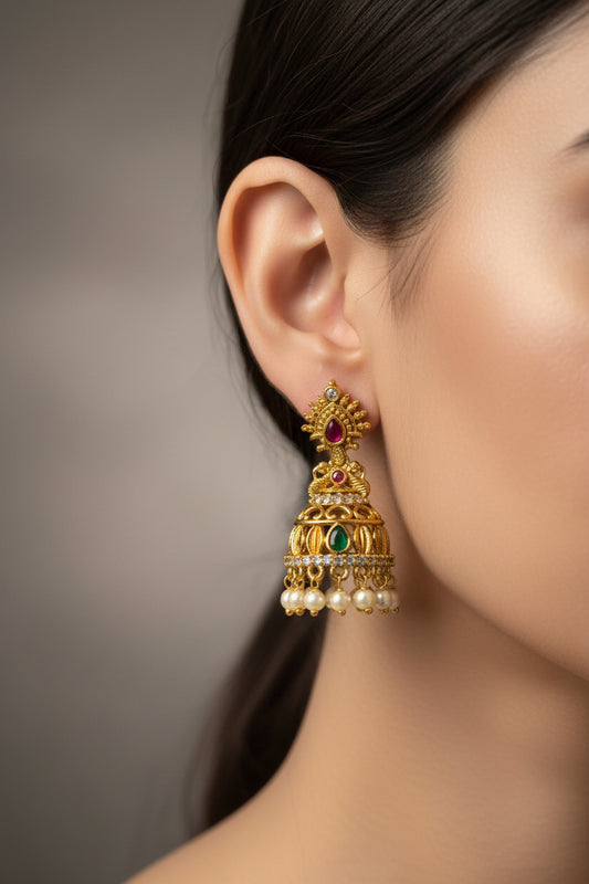 Gold earrings with gemstones