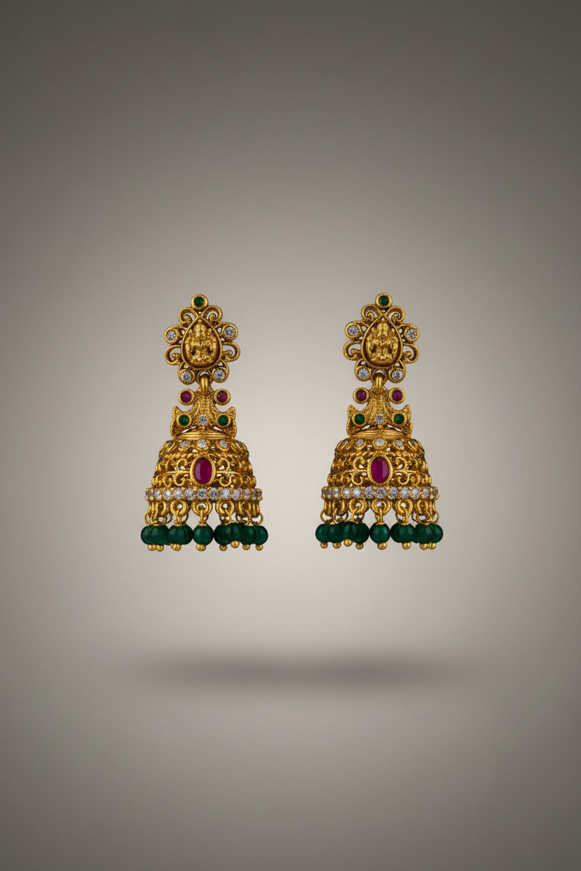 Gold Plated Temple Lakshmi Jhumka Earrings with Ruby Stone & Bead Drops