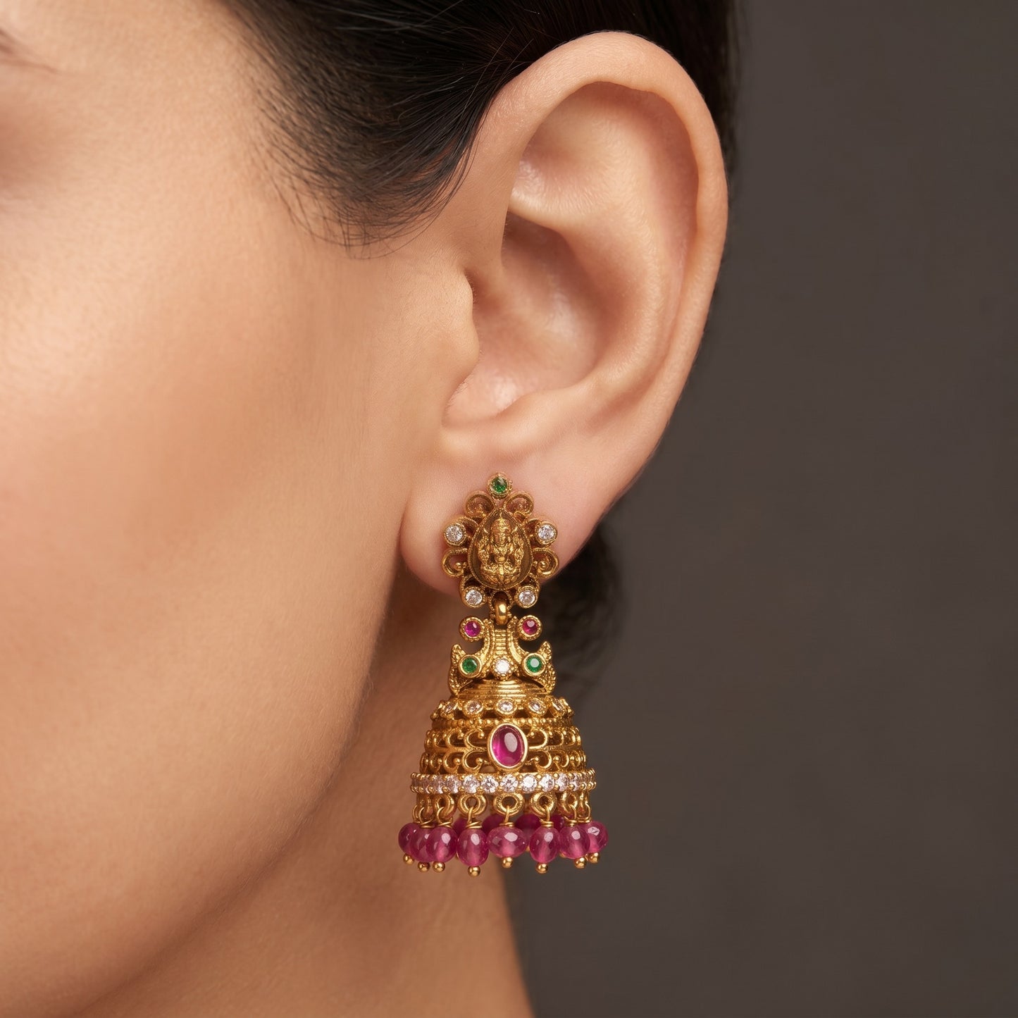Gold Plated Temple Lakshmi Jhumka Earrings with Ruby Stone & Bead Drops