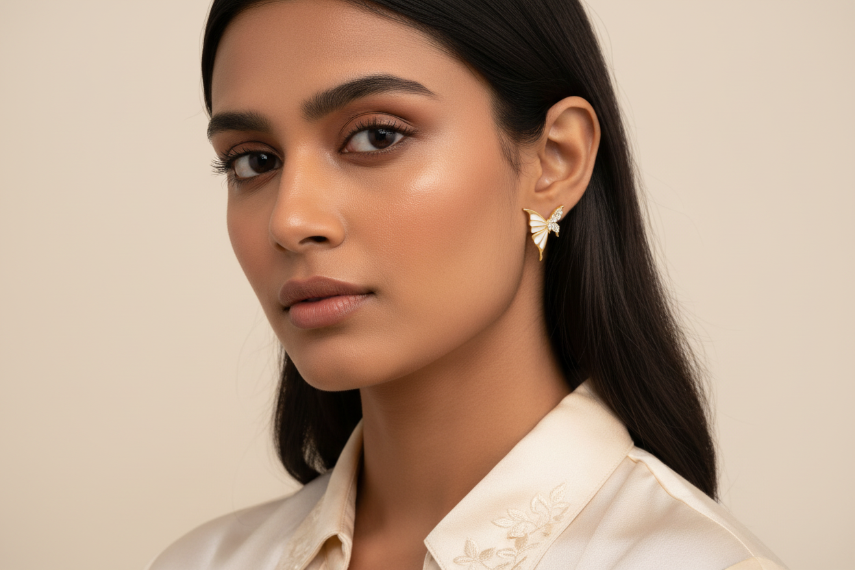 Woman wearing a white blouse with a neutral background